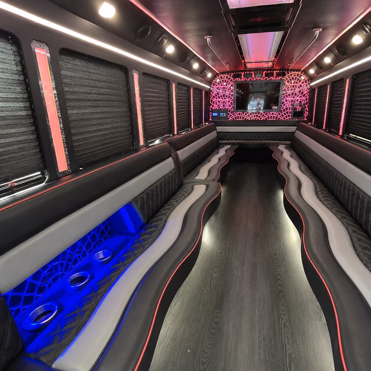 Group beside a Mercedes Sprinter limo in Fort Lauderdale